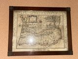 an old map of the island of st maarte in a wooden frame