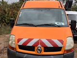 an orange van that is parked on the side of the road