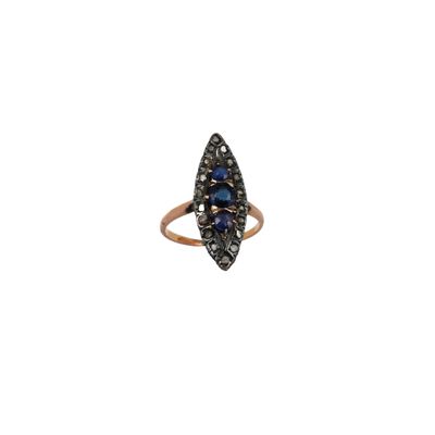an image of a ring with a blue stone and black diamonds