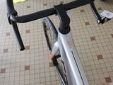 a close up of a bicycle on a tiled floor