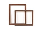 two wooden frames on a white background with a white background