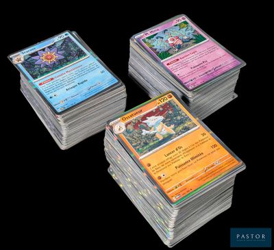 a close up of a pile of cards on a black background