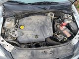 a car that has its hood open with the engine in it