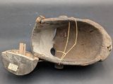 a baseball glove that has been broken and is sitting on a table