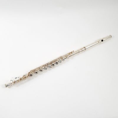 a flute that is sitting on top of a table