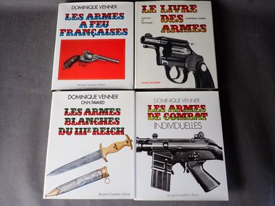 four books on a table with a gun, knife, and other items