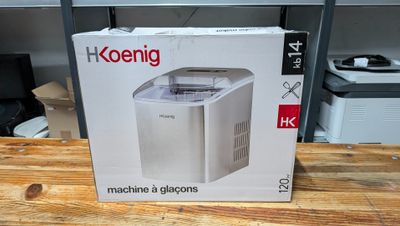 a box that has a machine in it on a table