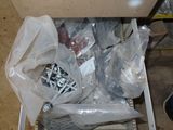 a drawer full of assorted items in a room