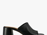 black leather mulers with a block heel and open toe