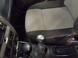 a picture of the inside of a car with a steering control