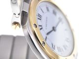 an image of a close up of a wrist watch with roman numerals