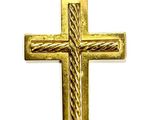 a gold cross pendant on a white background