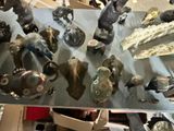 a lot of figurines that are on a table