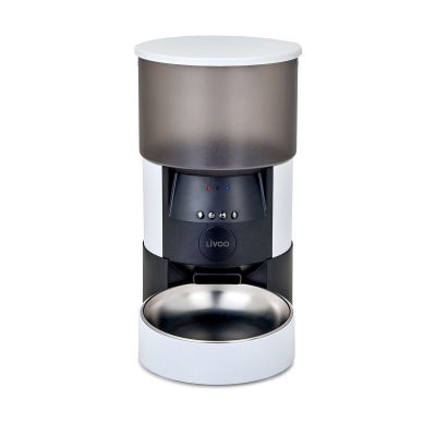 an image of a coffee grinder with a cup on top of it