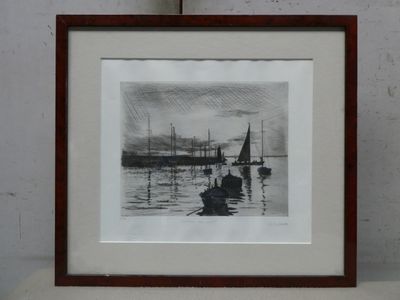 a black and white photo of a boat in the water