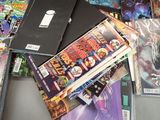 a lot of comic books on the table