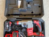 a tool in a case that is sitting on the floor