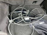 wires and cords in the trunk of a car