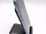 a close up of a cell phone on a stand