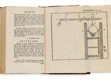 an open book with a drawing of a machine on it