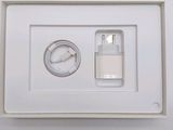 a white box with a charger and a charger on it