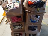 many boxes stacked on top of each other in a warehouse