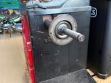 a machine that is sitting on a pallet in a store