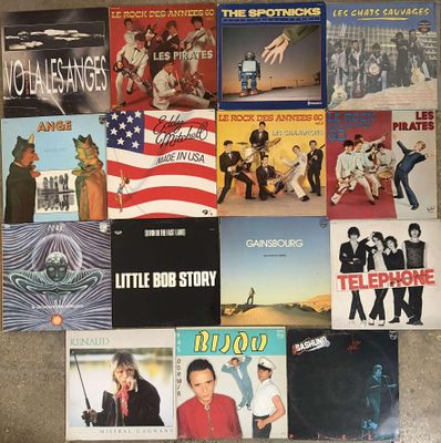 a lot of various album covers on the floor