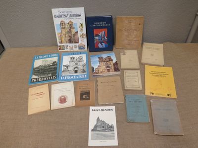 many books that are sitting on a table