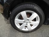 a close up of a tire on a car ' s rim
