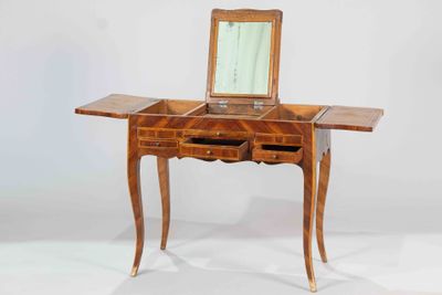 an image of a wooden desk with a mirror on top of it