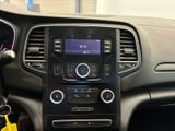 the interior of a car with a steering control and a key in the center