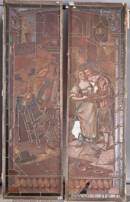 deux panneaux de vitraux sur lesquels est représentée une peinture