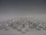 a lot of empty wine glasses on the table