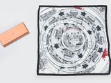 an image of a square scarf with a picture of a city on it