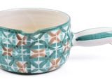 an image of a cup with a spoon in it on a white background