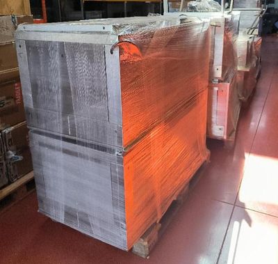 a stack of boxes sitting on a pallet in a warehouse