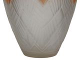 an image of a glass vase with an orange and white design