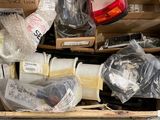 a box full of assorted items that are sitting on the floor