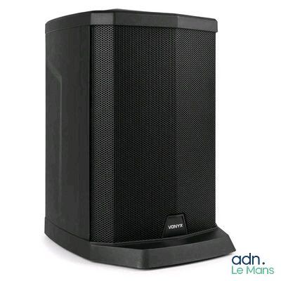 a close up of a black speaker on a white background