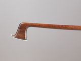a close up of a wooden handle on a wooden stick