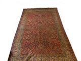 an oriental rug with a red and green design on a white background