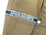 a close up of a jacket with a button on it