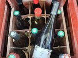 many bottles of wine in a red box