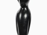 sculpture of a black bird on a black base on a white background