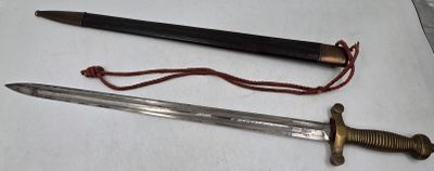 two different types of knives on a table