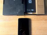 a box with a phone inside of it sitting on a table
