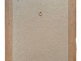 an old picture of a piece of paper with a ring on it