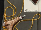 a drawing of a purse with a cord attached to it