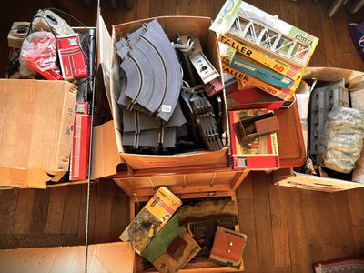 many boxes of assorted items sitting on the floor